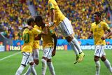 thumbnail: BRASILIA, BRAZIL - JUNE 23:  Neymar of Brazil (L) celebrates scoring his team's first goal with Luiz Gustavo and David Luiz of Brazil during the 2014 FIFA World Cup Brazil Group A match between Cameroon and Brazil at Estadio Nacional on June 23, 2014 in Brasilia, Brazil.  (Photo by Clive Brunskill/Getty Images)