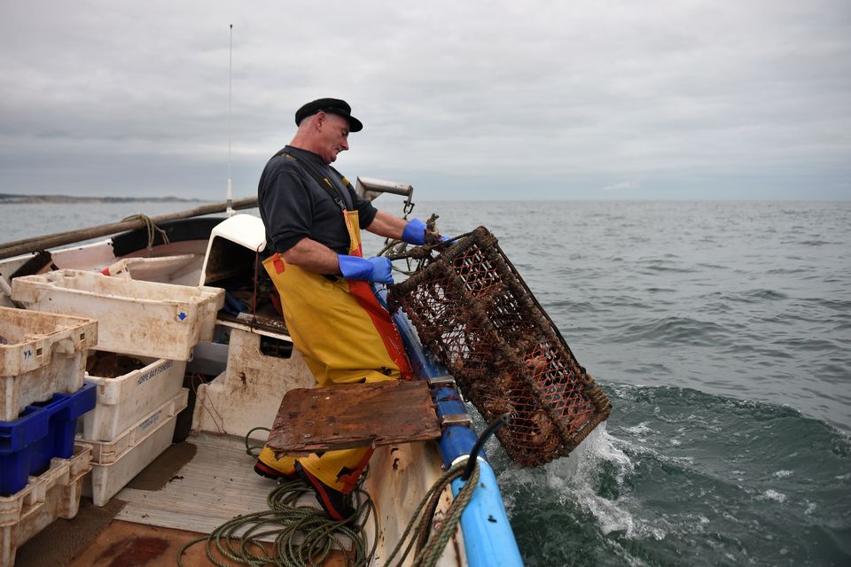 Cromer, Norfolk, UK – February 2022. Crab fishing boats, fishing