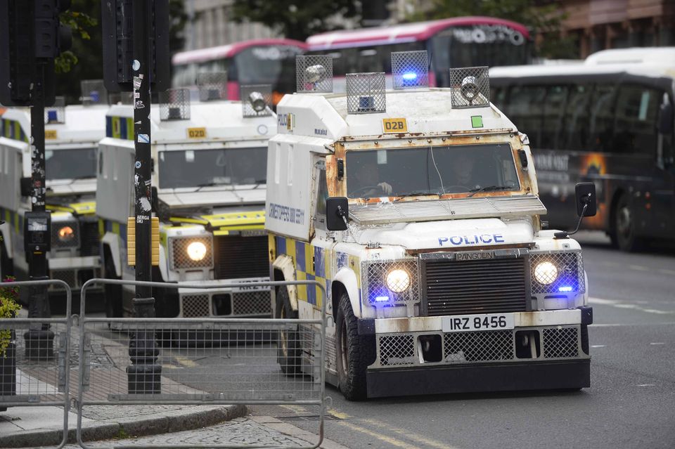 PSNI officers line the streets (Mark Marlow/PA)