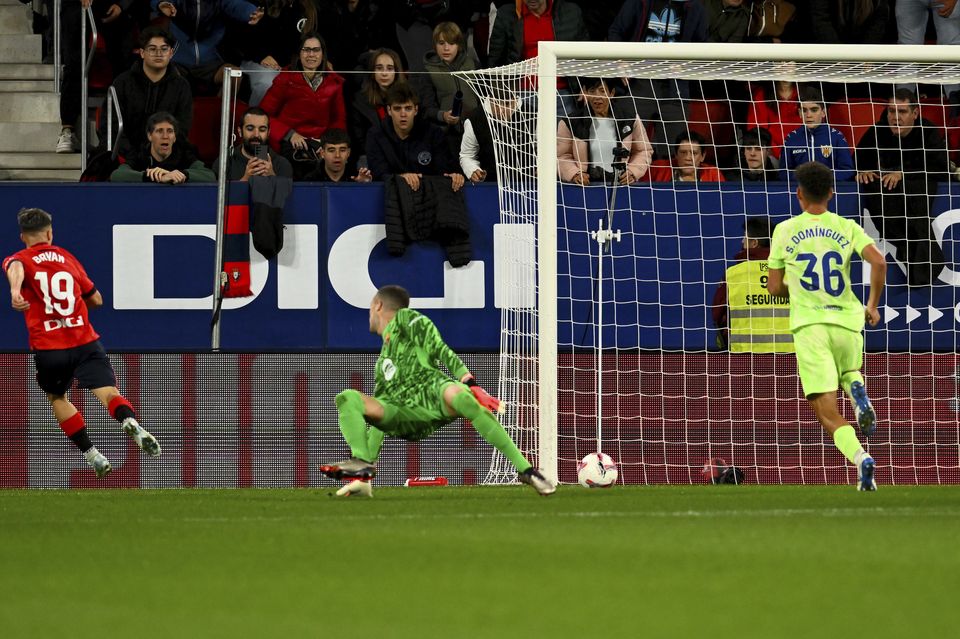 Bryan Zaragoza scores for Osasuna against Barcelona (Miguel Oses/AP)