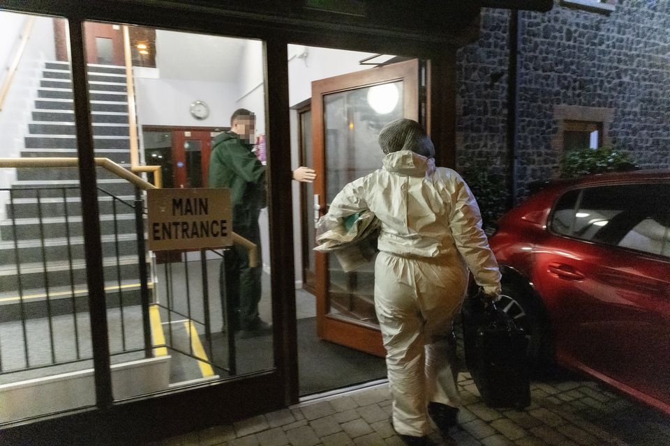 Police and forensics at the scene of a murder in a block of flats in West Street area of Newtownards on December 26th 2024 (Photo by Kevin Scott)