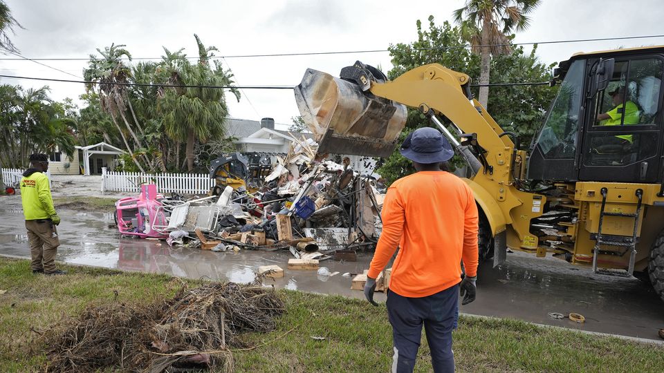 Crews are working to remove the debris before Hurricane Milton approaches Florida’s west coast (Chris O’Meara/AP)