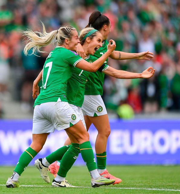 Julie-Ann Russell celebrates scoring for the Republic of Ireland against France with team-mate Lily Agg